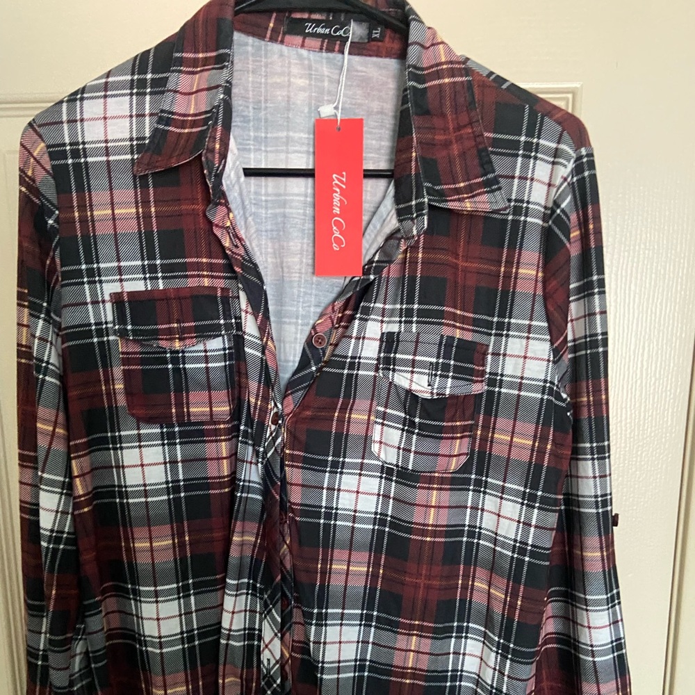 Reddish brown button down shirt